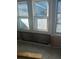 Unfinished interior room with original wood paneling and windows at 5 Palm Ave, Bradenton, FL 34208