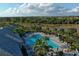 Aerial view of resort-style pool and lounge area at 5716 Bay Pine Way, Sarasota, FL 34238