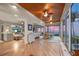 Sun-filled dining room with hardwood floors and water views at 585 Gunwale Ln, Longboat Key, FL 34228