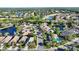 Aerial view of upscale community with lakes and golf course at 7615 Windward Cv, Lakewood Ranch, FL 34202