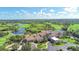 Aerial view of a luxurious clubhouse and golf course community at 7615 Windward Cv, Lakewood Ranch, FL 34202