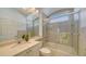 Clean bathroom with a shower/tub combo and updated vanity at 7615 Windward Cv, Lakewood Ranch, FL 34202