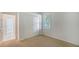 Charming bedroom with a closet and view into another room at 7615 Windward Cv, Lakewood Ranch, FL 34202