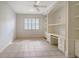 Home office with built-in shelving and cabinets, offering ample workspace at 7615 Windward Cv, Lakewood Ranch, FL 34202