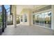 Spacious covered patio with sliding glass doors at 7615 Windward Cv, Lakewood Ranch, FL 34202