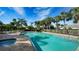Enjoy this community pool with plenty of space for lounging at 7615 Windward Cv, Lakewood Ranch, FL 34202