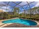 Inviting kidney-shaped pool with screened enclosure at 12240 Thornhill Ct, Lakewood Ranch, FL 34202