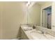 Bathroom with dual sinks and granite countertops at 13051 Utopia Loop, Bradenton, FL 34211