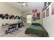 Bright bedroom with a bed, desk, and wall decor at 13051 Utopia Loop, Bradenton, FL 34211