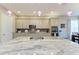 Gourmet kitchen featuring granite countertops and stylish pendant lighting at 13051 Utopia Loop, Bradenton, FL 34211