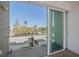 Private balcony with glass railings and city views at 1720 Alderman St, Sarasota, FL 34236