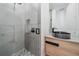 Stylish bathroom with a modern sink, a walk-in shower, and pebble accents at 1720 Alderman St, Sarasota, FL 34236