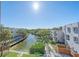 Aerial view of property showing canal, dock, and modern homes at 1720 Alderman St, Sarasota, FL 34236