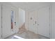 Bright and airy entryway with modern staircase at 1720 Alderman St, Sarasota, FL 34236