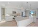 Modern kitchen with island and stainless steel appliances at 1720 Alderman St, Sarasota, FL 34236