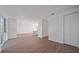 Bright and airy living room with hardwood floors and access to balcony at 1720 Alderman St, Sarasota, FL 34236