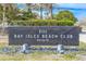 Entrance sign for the private Bay Isles Beach Club at 1930 Harbourside Dr # 152, Longboat Key, FL 34228