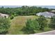 Build your dream home on this large lot, surrounded by lush trees and nature at 19439 Beacon Park Pl, Bradenton, FL 34202