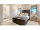 Cozy bedroom with ensuite bathroom and plenty of natural light at 19439 Beacon Park Pl, Bradenton, FL 34202