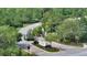 Gated community entrance with landscaped entryway at 19439 Beacon Park Pl, Bradenton, FL 34202