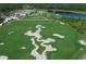 Aerial view of a meticulously designed golf course at 19439 Beacon Park Pl, Bradenton, FL 34202
