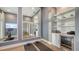 Bright home gym with large mirror, beverage center, and yoga mats at 19439 Beacon Park Pl, Bradenton, FL 34202