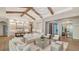 Open concept living room with kitchen and breakfast bar visible at 19439 Beacon Park Pl, Bradenton, FL 34202
