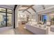 Bright and airy living room with hardwood floors and a view to the kitchen at 19439 Beacon Park Pl, Bradenton, FL 34202