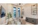 Stylish home office featuring built-in shelving and large windows at 19439 Beacon Park Pl, Bradenton, FL 34202