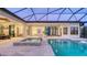 Stunning pool and spa with covered lanai and water features at 19439 Beacon Park Pl, Bradenton, FL 34202