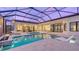 Expansive pool and spa with covered lanai at 19439 Beacon Park Pl, Bradenton, FL 34202