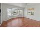Bright bedroom with hardwood floors and large window at 2107 Palma Sola Blvd # 84, Bradenton, FL 34209