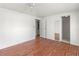 Spacious bedroom with hardwood floors and an ensuite bath at 2107 Palma Sola Blvd # 84, Bradenton, FL 34209