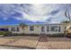 Inviting front exterior featuring a well-maintained walkway and beautiful landscaping at 2107 Palma Sola Blvd # 84, Bradenton, FL 34209