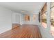 Sunroom with wood-look floors and multiple windows at 2107 Palma Sola Blvd # 84, Bradenton, FL 34209