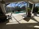 Inviting screened pool area with patio furniture and a relaxing atmosphere at 240 Dove Trl, Bradenton, FL 34212