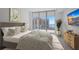 Bright bedroom with large windows and city views at 301 Quay Commons # 1111, Sarasota, FL 34236