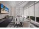 Bright conference room with large table and city views at 301 Quay Commons # 1111, Sarasota, FL 34236