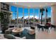 Modern lobby with comfortable seating and large windows overlooking the street at 301 Quay Commons # 1111, Sarasota, FL 34236