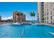 Relaxing rooftop pool with a spa and stunning city views at 301 Quay Commons # 1111, Sarasota, FL 34236