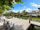 Private waterfront dock with seating, perfect for enjoying the waterfront views at 3460 Flamingo Ave, Sarasota, FL 34242