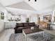 Spacious living room with high ceilings, a comfortable seating area, and an open kitchen at 3460 Flamingo Ave, Sarasota, FL 34242