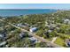 Aerial view of a single Gathering home in a quiet neighborhood at 3511 Camino Real, Sarasota, FL 34239