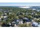 Aerial view of a single-Gathering home in a residential neighborhood at 3511 Camino Real, Sarasota, FL 34239