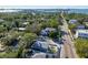 Wide aerial view of the house and neighborhood at 3511 Camino Real, Sarasota, FL 34239