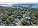 Aerial view of a house and its surrounding neighborhood near the water at 3511 Camino Real, Sarasota, FL 34239