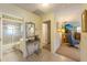 Clean bathroom with shower and granite vanity at 3511 Camino Real, Sarasota, FL 34239