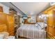 Main bedroom with ample closet space and striped bedding at 3511 Camino Real, Sarasota, FL 34239