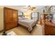 Bedroom with a double bed, dresser, and large closet at 3511 Camino Real, Sarasota, FL 34239