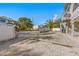 Property exterior with gated entry and ample parking at 3511 Camino Real, Sarasota, FL 34239